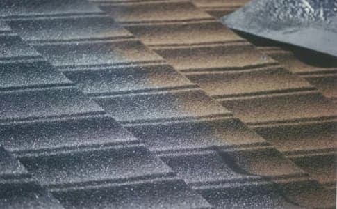 Roof before resurfacing - faded and weathered